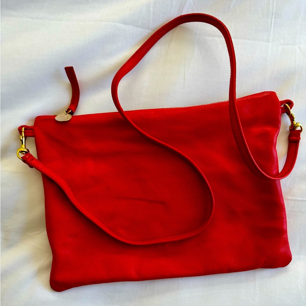 Clare V red clutch bag with removable crossbody strap